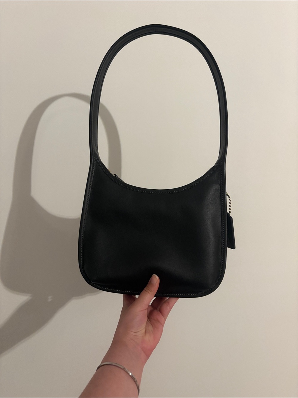 Brand new without tags coach curve zip in black leather